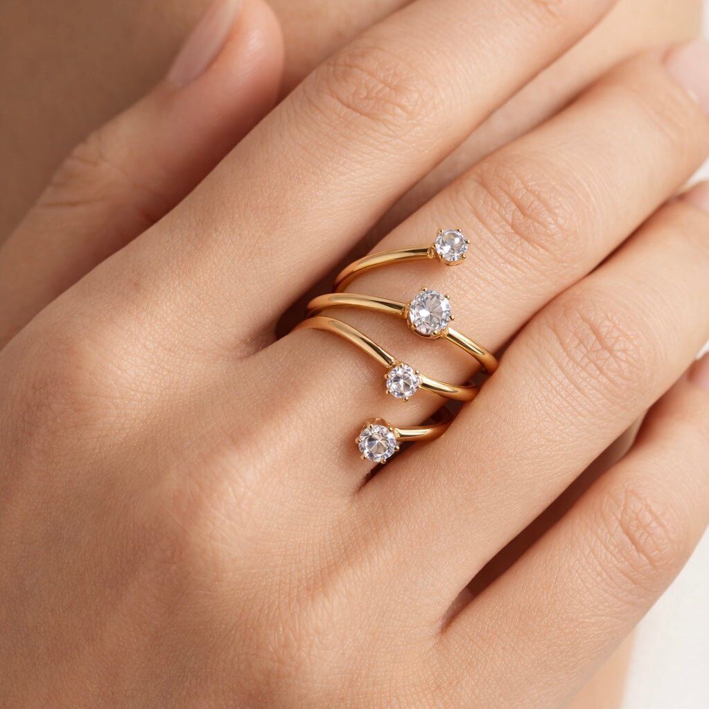 Spiral Gold - Anello regolabile con zirconi