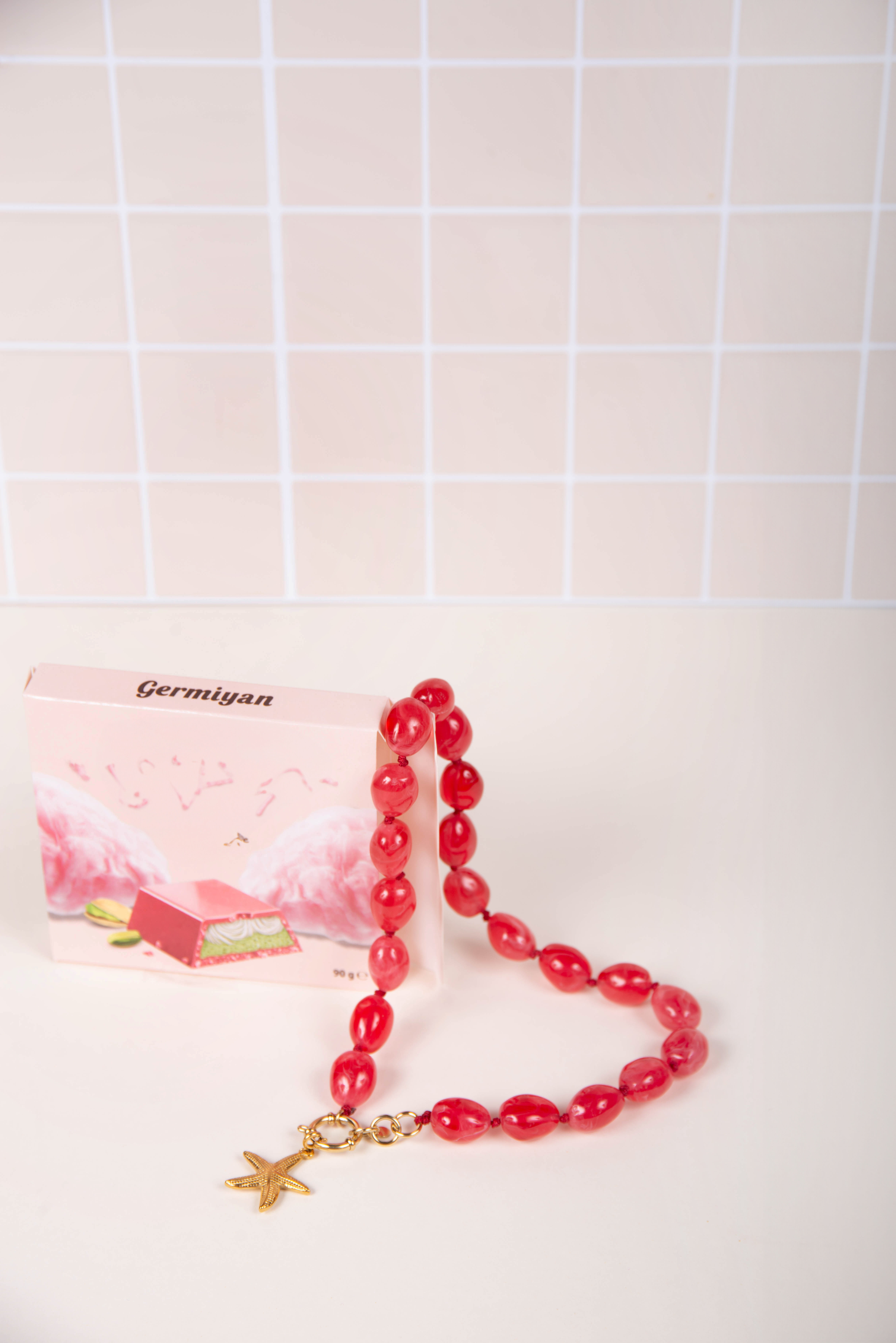 Collier résine rose - avec charms étoile de mer