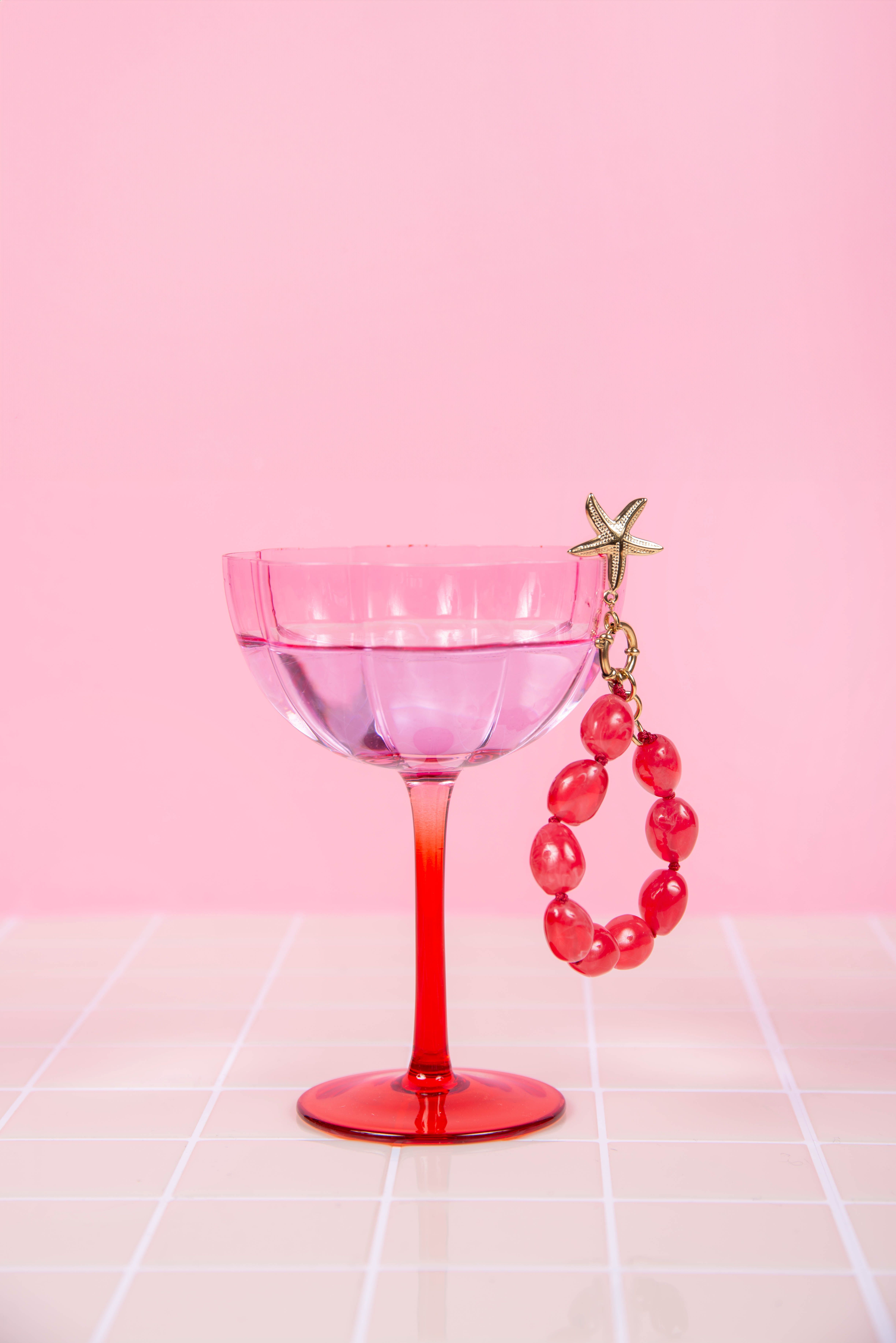 Bracelet résine rose - avec charms étoile de mer