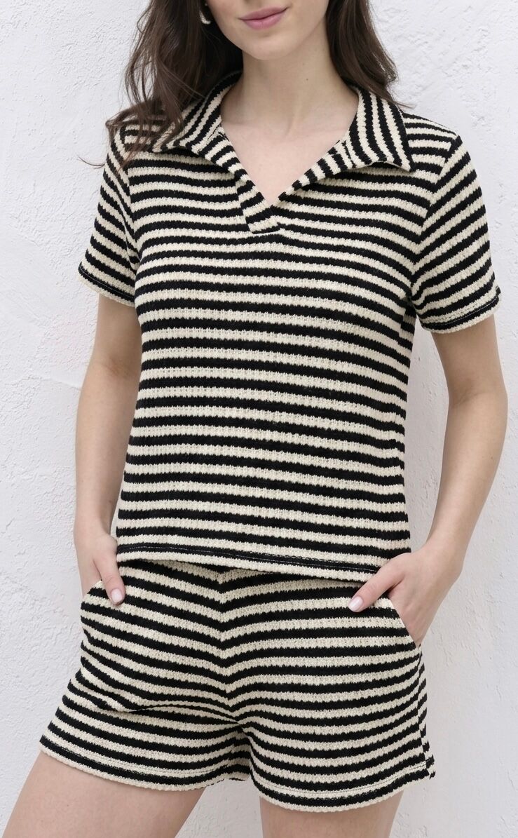 Finely textured knit polo top with short sleeves, polo collar, V-neck, and two-tone horizontal stripe