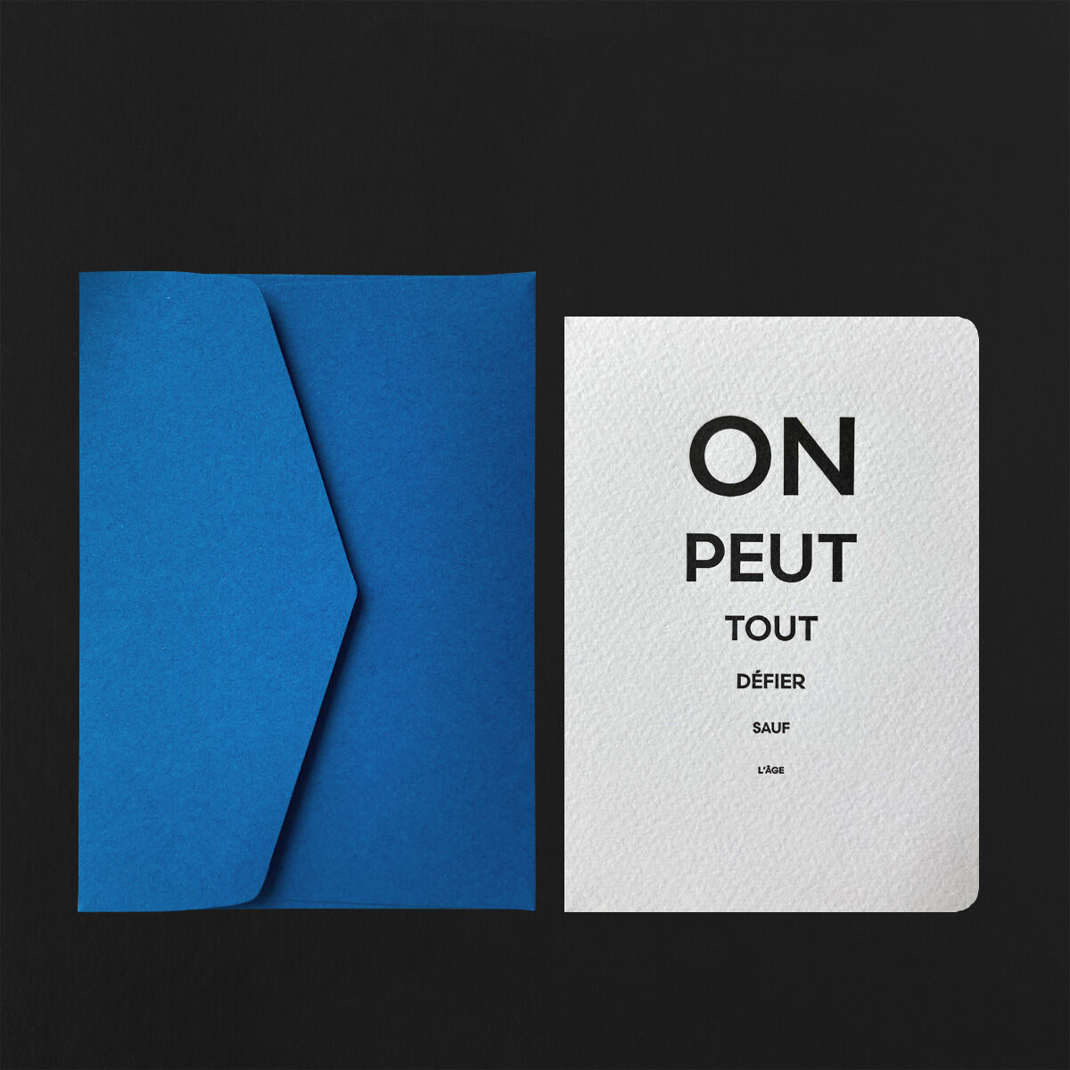 Postcard "We Can Challenge Anything" + sapphire envelope