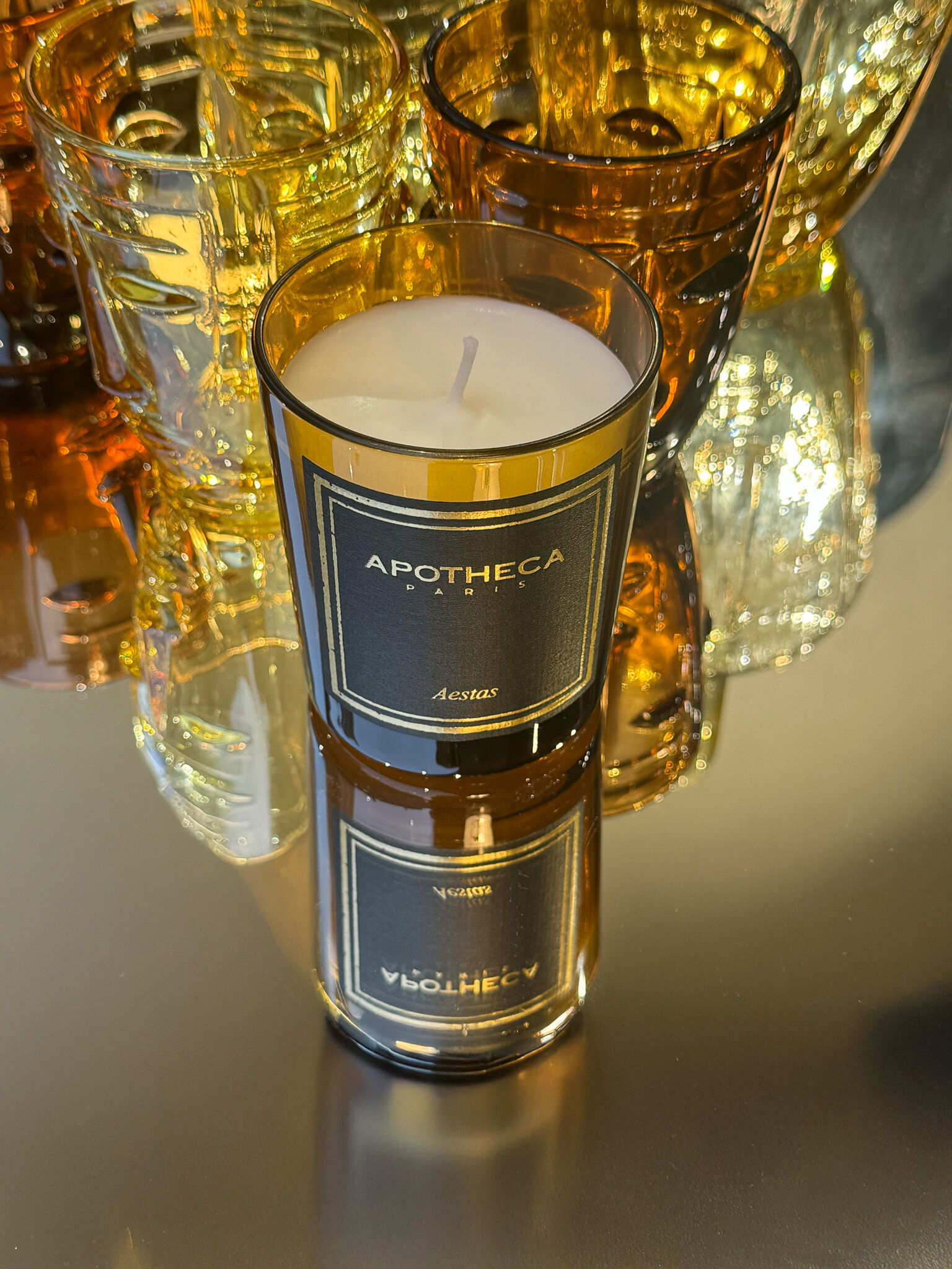 TESTER CANDLE 190G APOTHECA AMBER GLASS CANDLE AESTAS scent (monoi)
