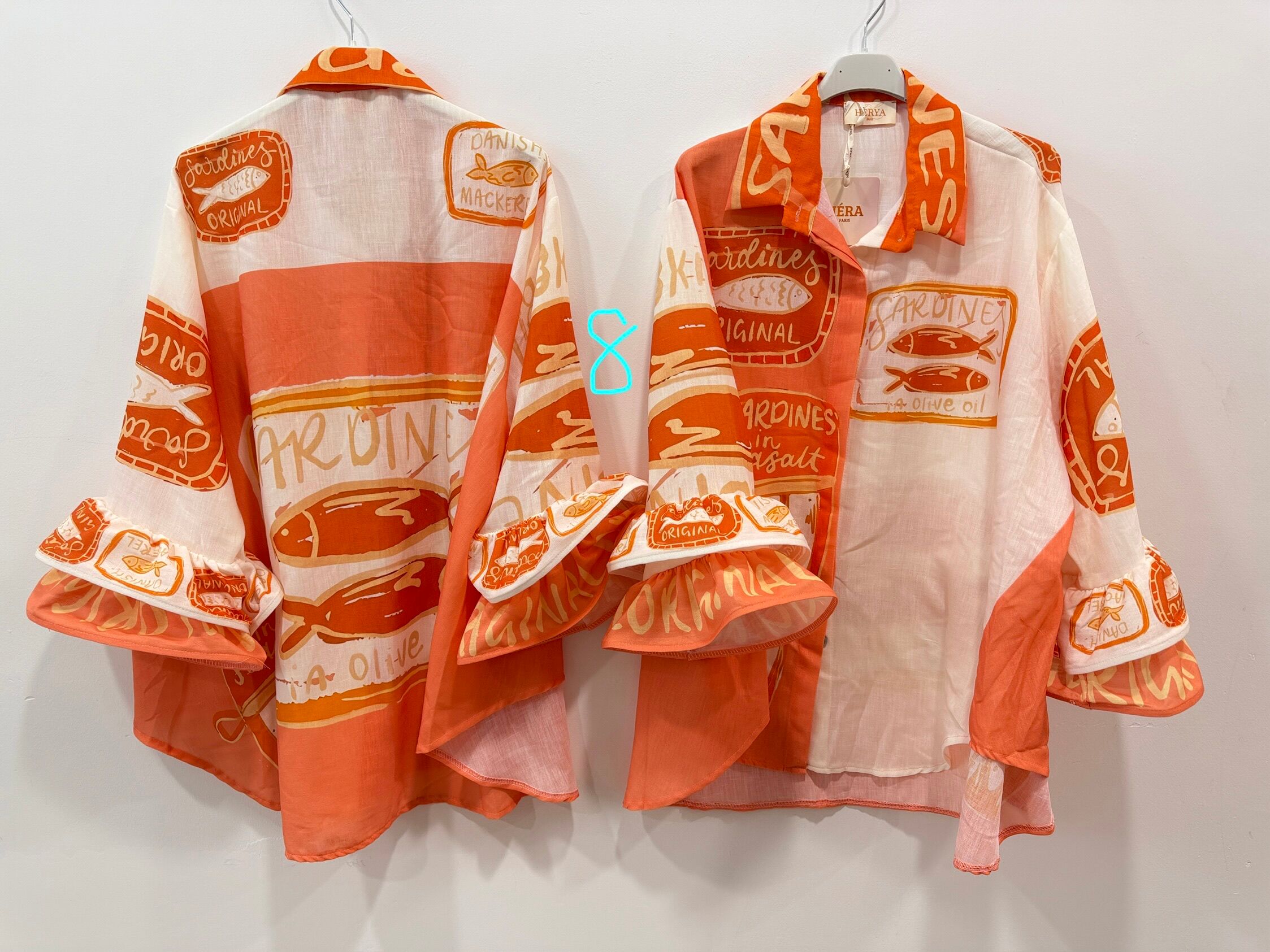 Chemise ample manches longues évasées terminées par de superbes doubles volants superposés imprimé divers coloré
