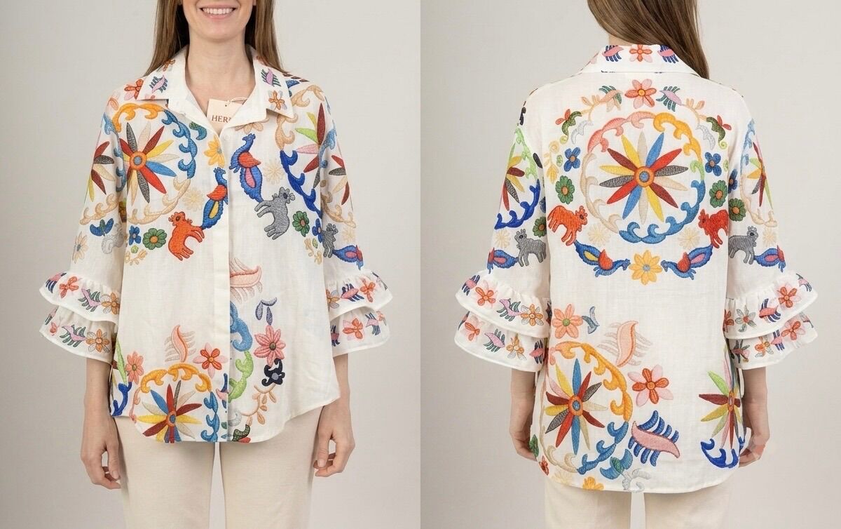 Loose-fitting shirt with long flared sleeves finished with stunning double ruffles in a variety of colorful prints.