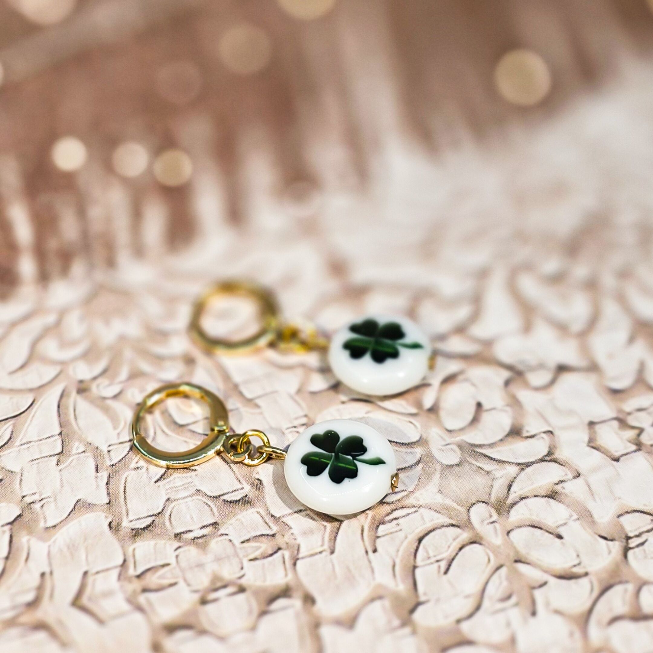 Bohemian chic four-leaf clover heart pendant sleeper earrings. Perfect for Mother's Day, a gift for Mom, a Christmas gift for a teacher.