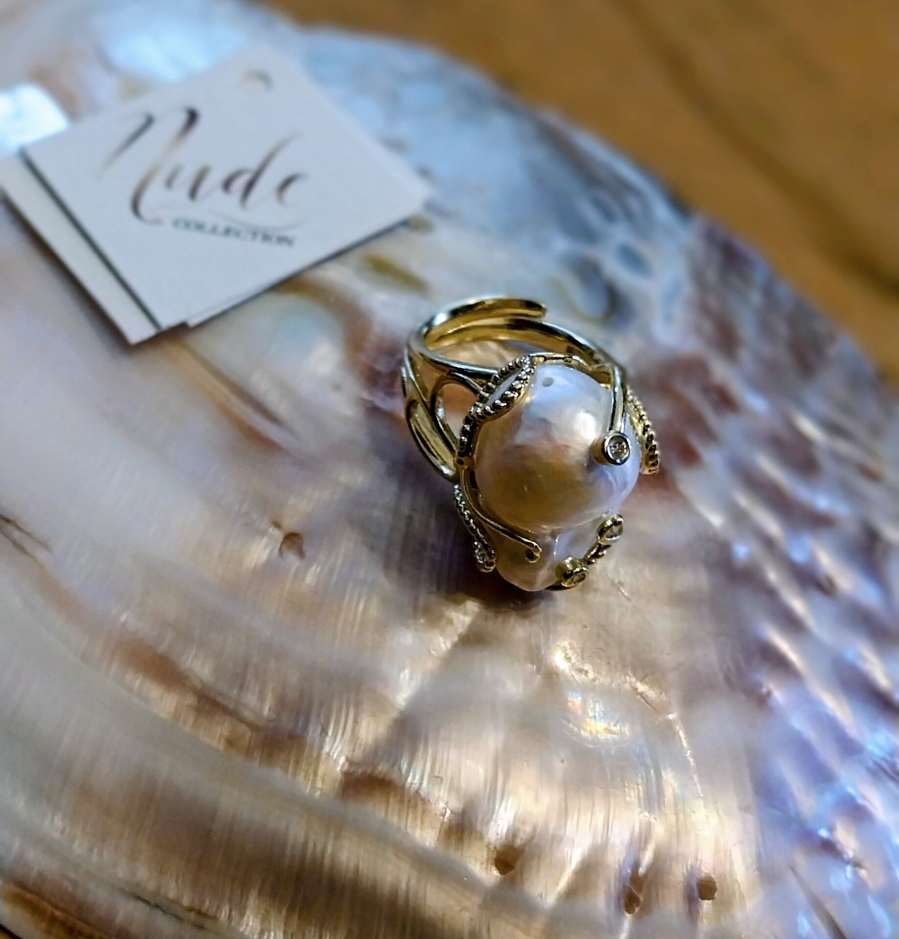 Adjustable ring in steel and baroque pearl