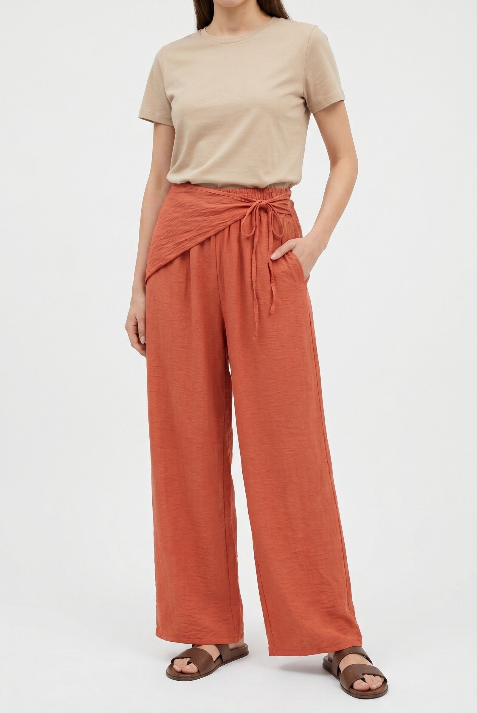 Wide-leg flowing trousers with a pareo panel