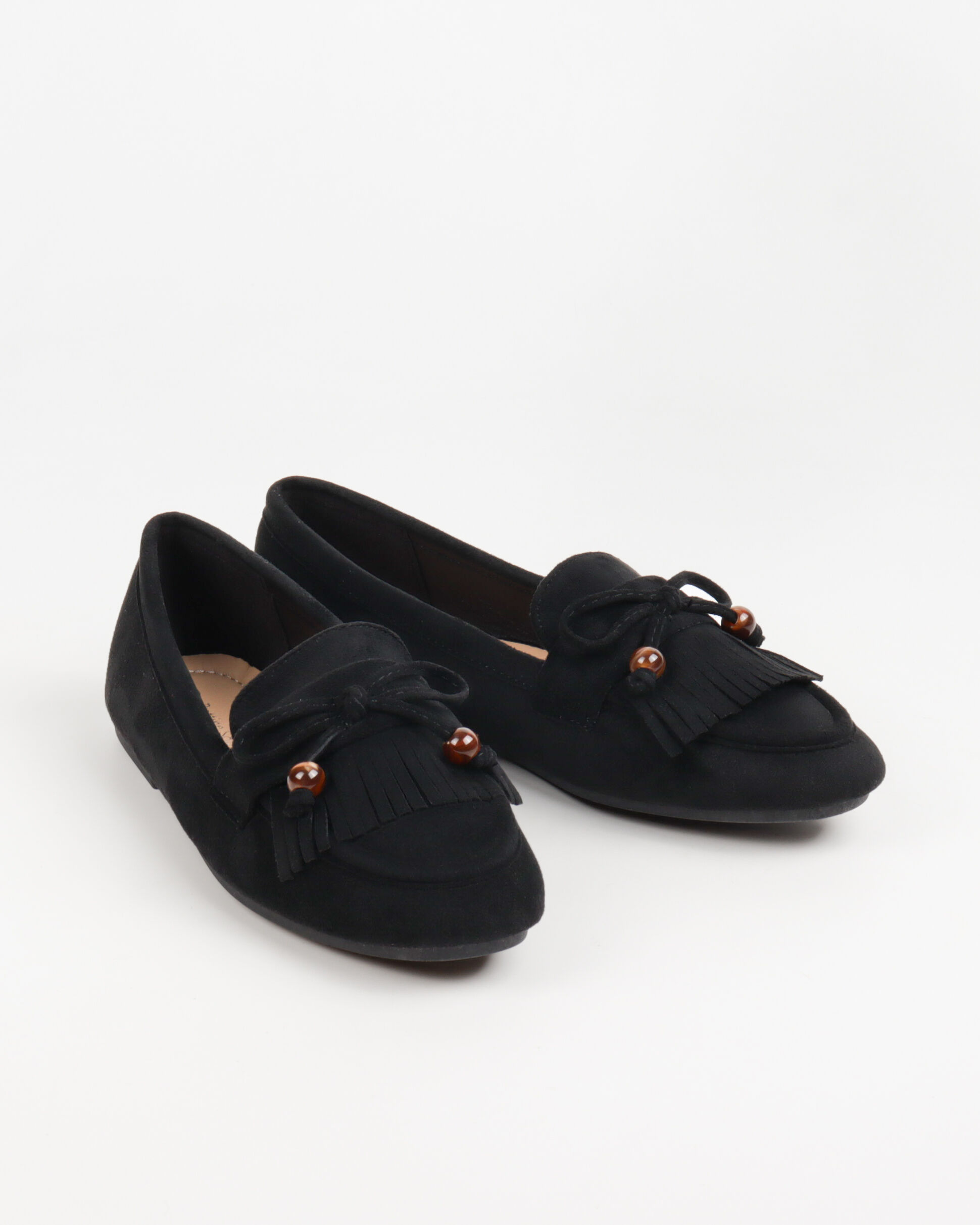 Women's flat moccasins with fringe, bow and beaded details