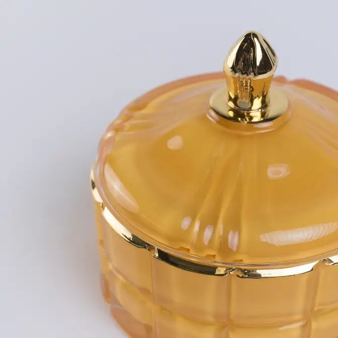 Scatola in vetro giallo con dettagli dorati, piccolo contenitore per gioielli.