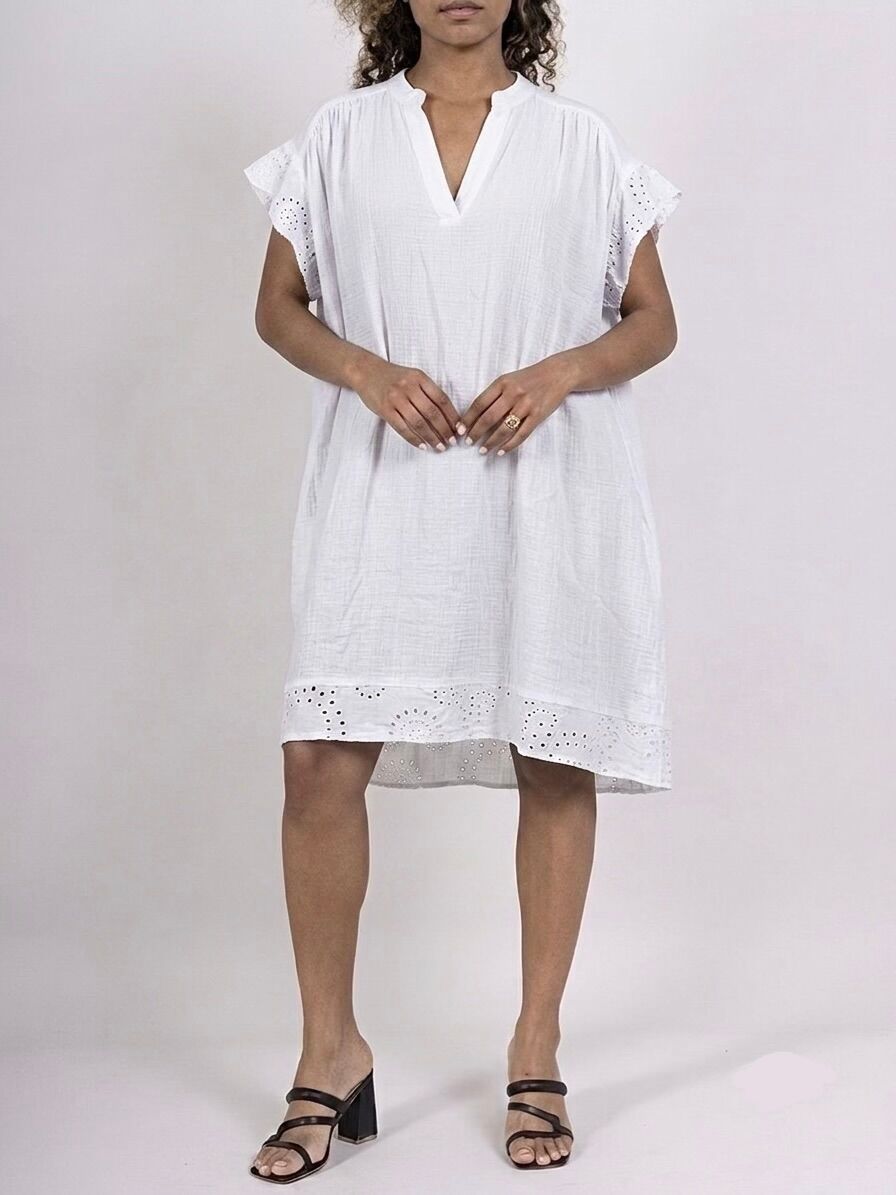 Loose-fitting tunic dress in linen-cotton with a mandarin collar, short sleeves, and openwork eyelet embroidery bands on the sleeve edges and hem.