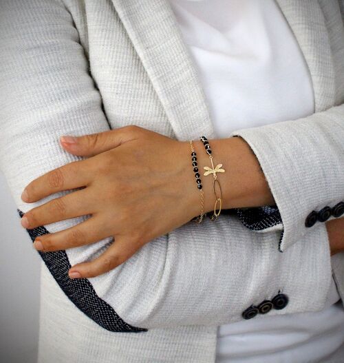 Gold dragonfly bracelet with black crystals