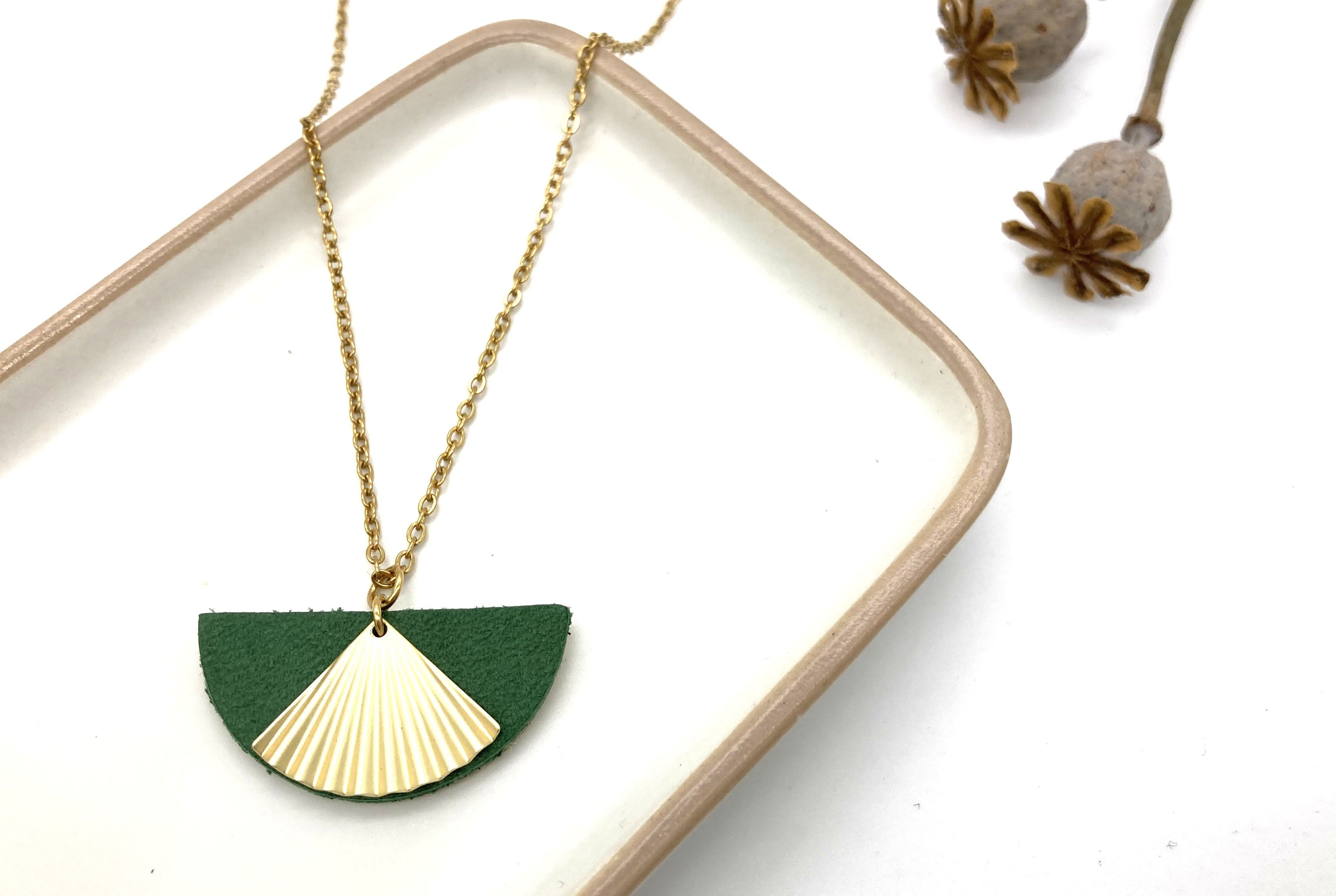 Green half moon necklace