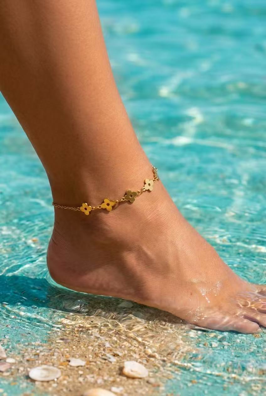 Trendy gold-tone stainless steel anklet with flowers