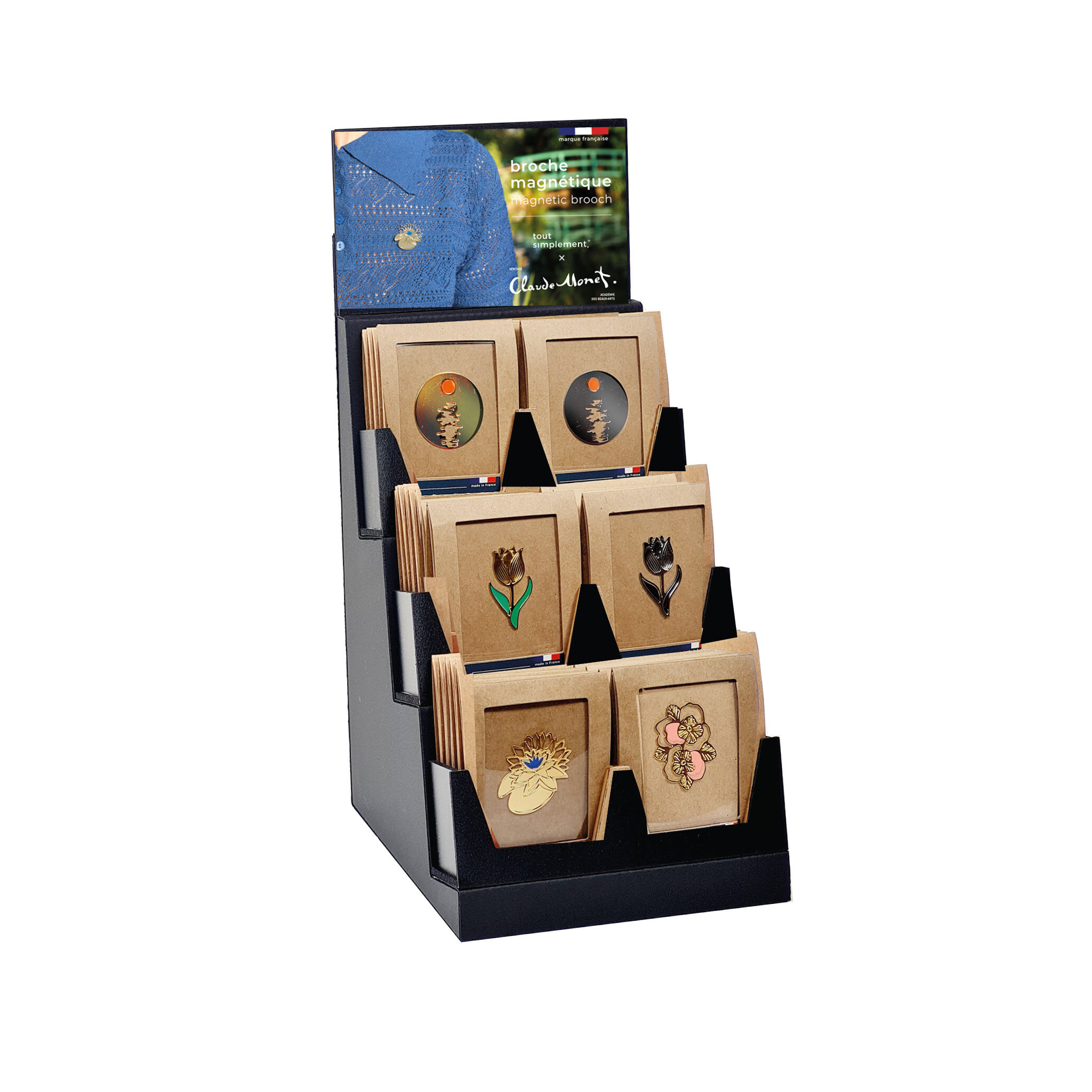 display stand full of 30 Claude Monet brooches