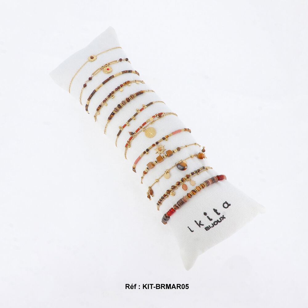 Set of 12 bracelets. Cushion offered.
