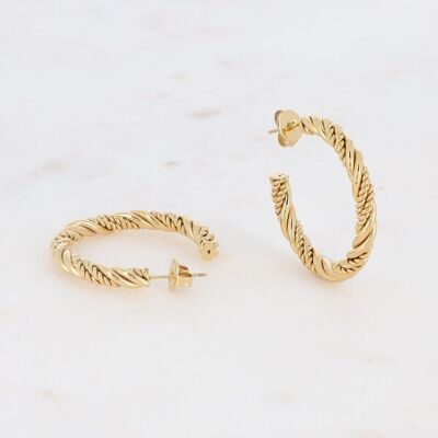Twisted hoop earrings and golden double spirals