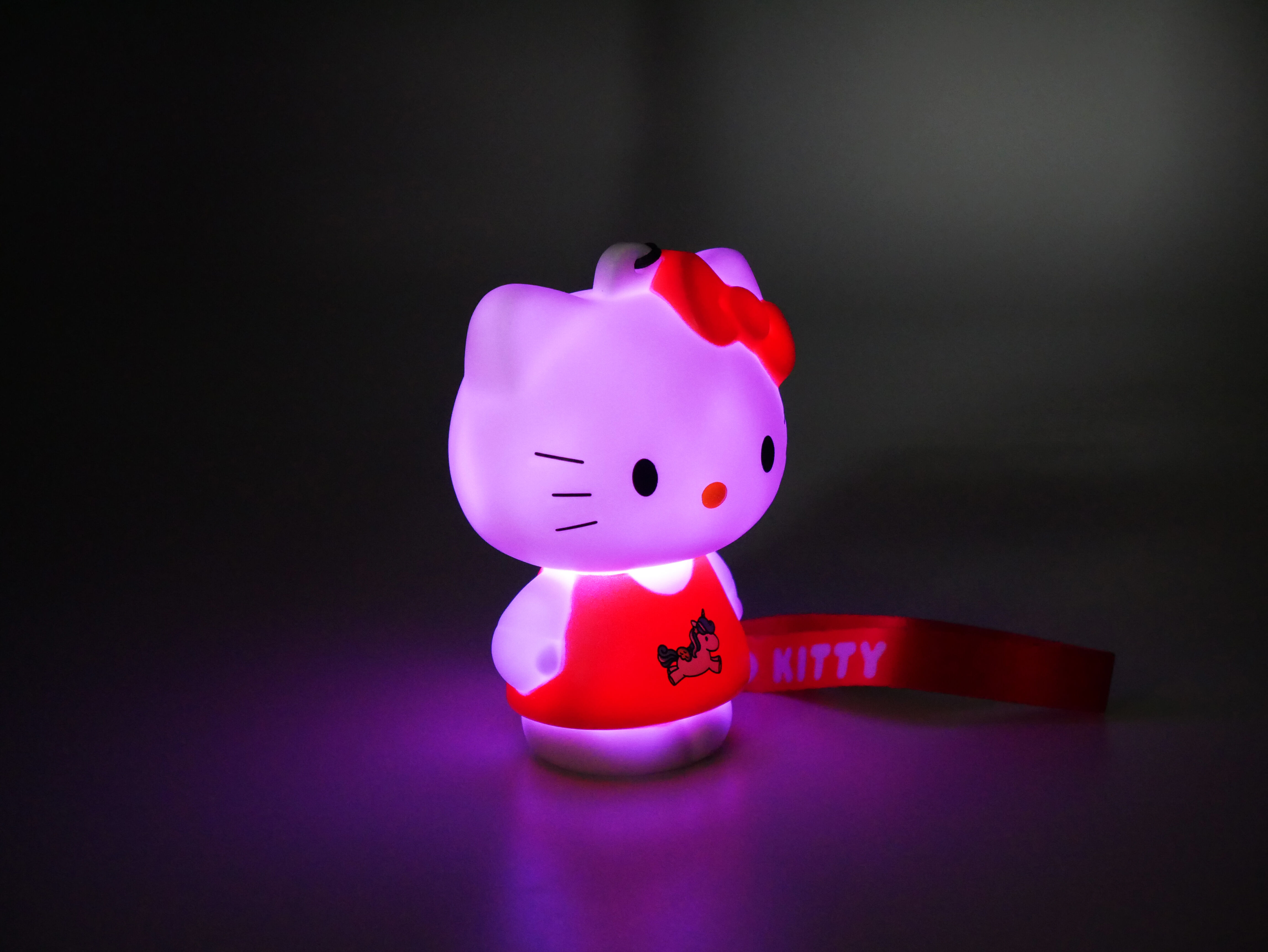 Buy wholesale HELLO KITTY light-up unicorn with wrist strap