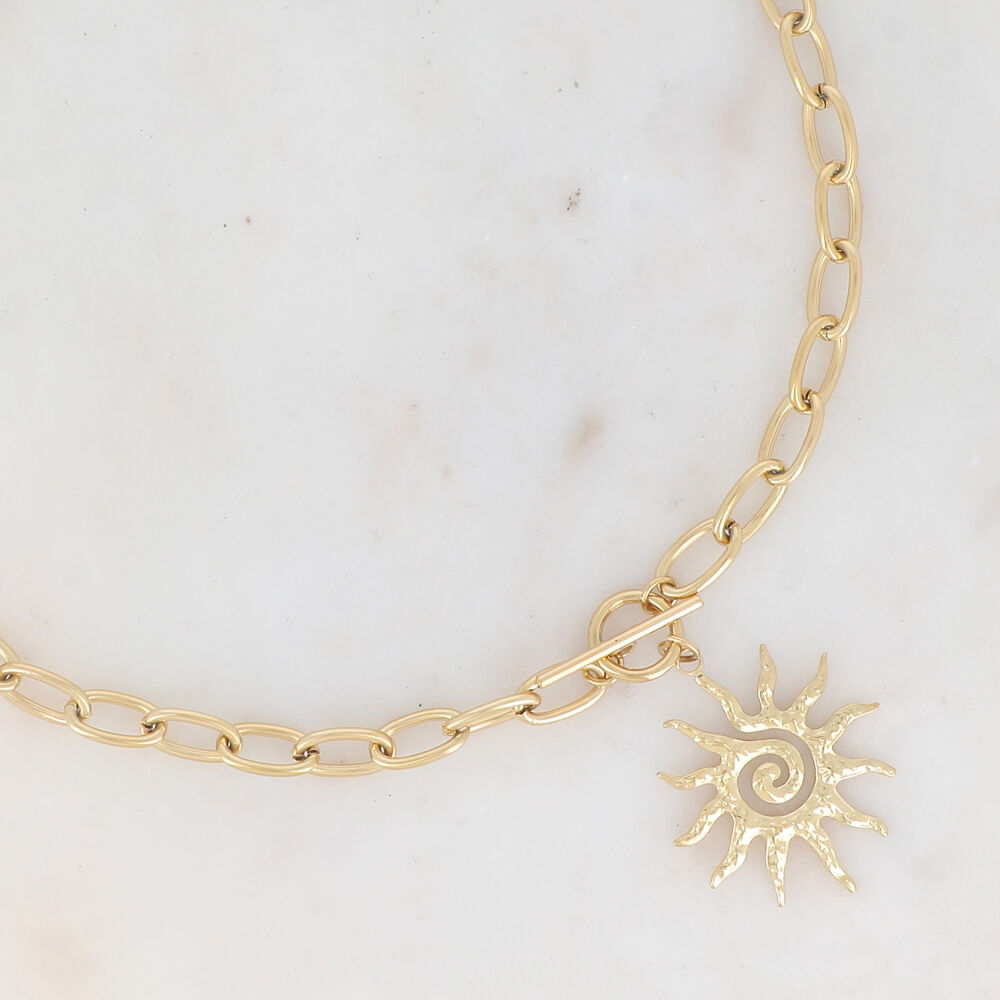 Mesh necklace with hammered sun