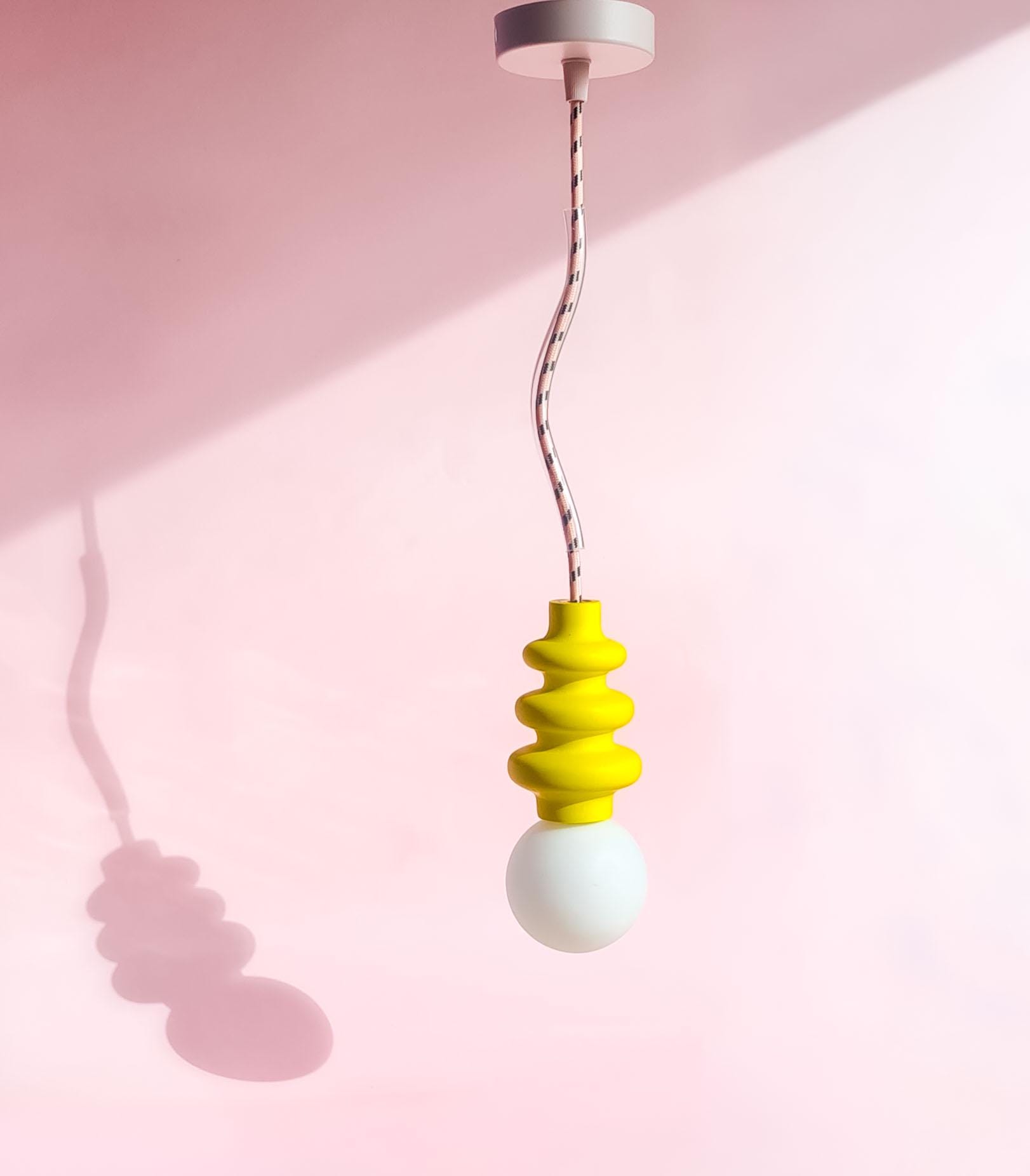 Handmade hanging accent lamp | yellow with pink and black textile cord and plexi transparant squiggle