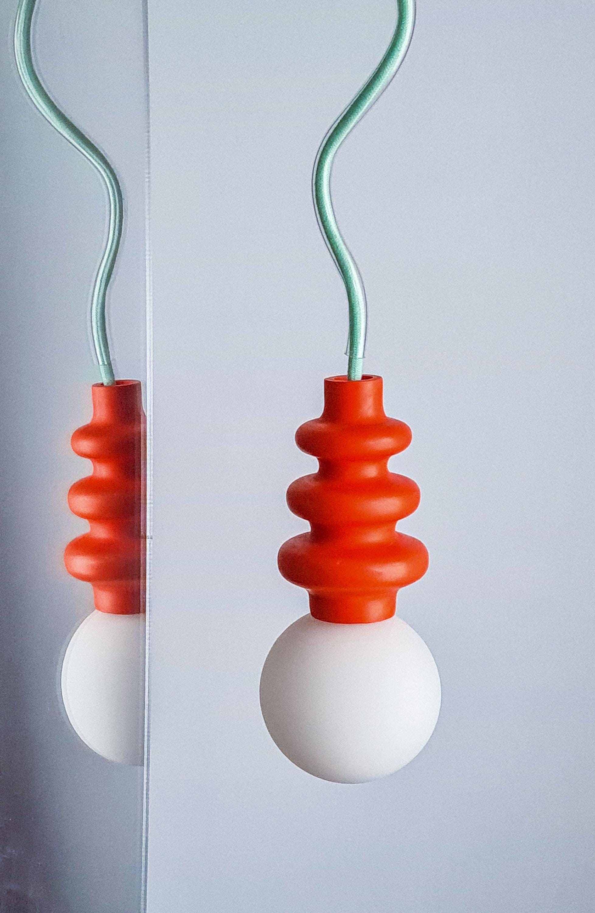 Handmade hanging accent lamp | red with green textile cord and transparant plexi squiggle
