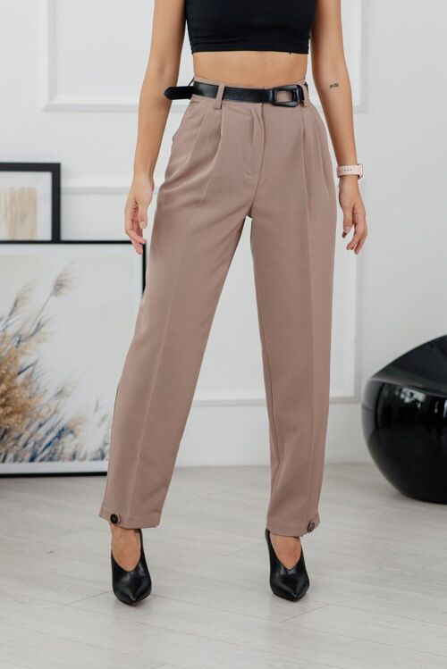 Pantalon beige à la taille avec flèches