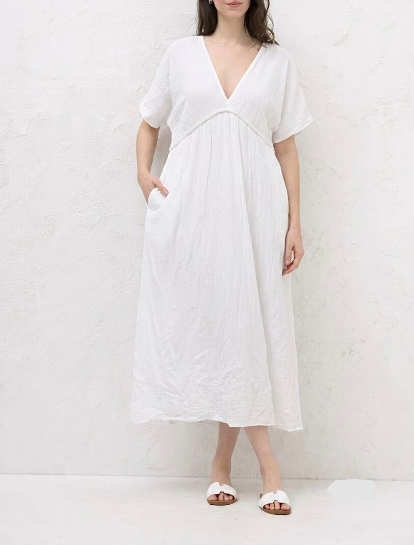 Long lined dress with short sleeves, V-neck, braided waist, and empire waist