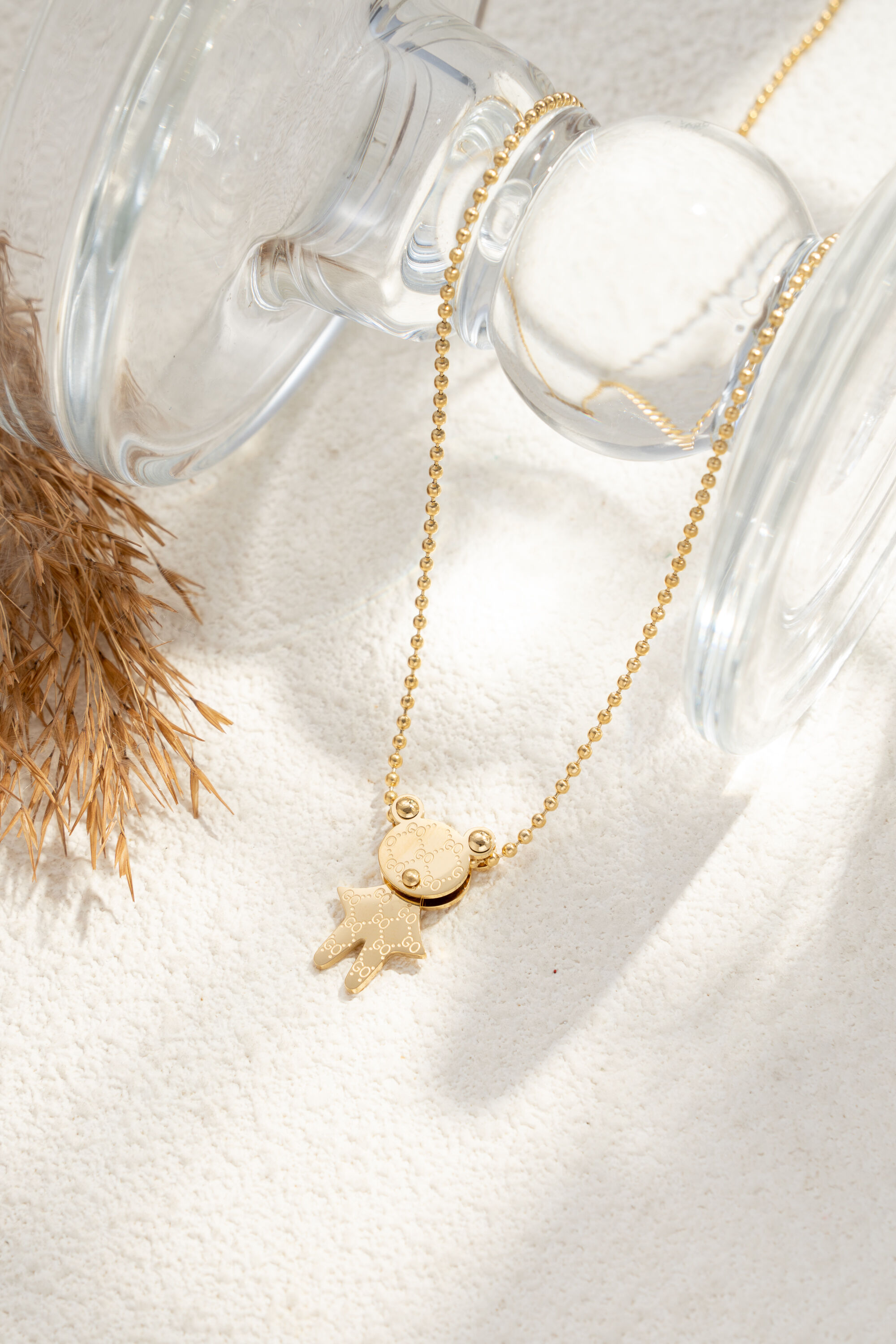 Women's delicate and elegant gold teddy necklace in stainless steel