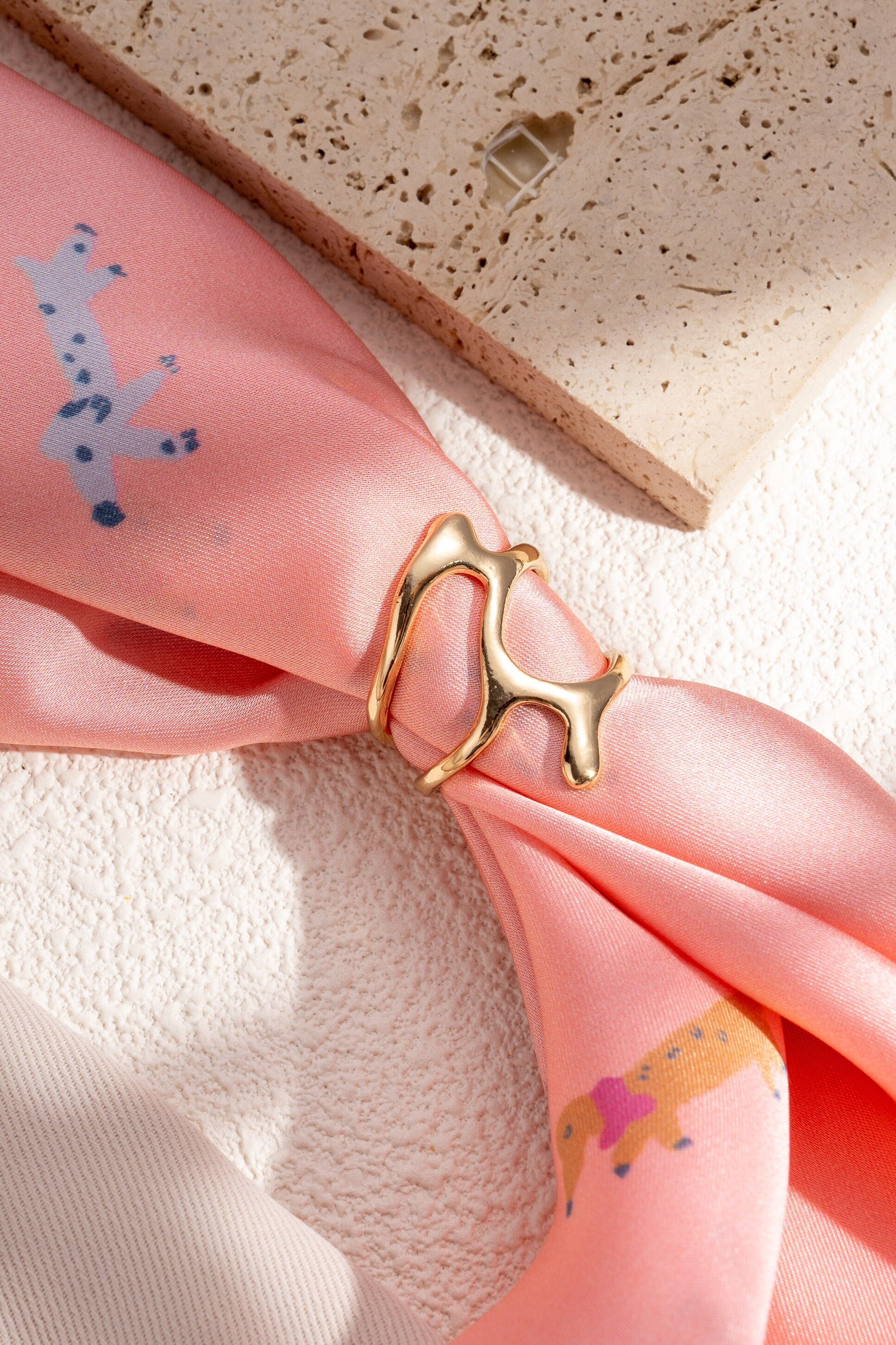 Elegant organic-shaped gold-tone metal scarf buckle accessory