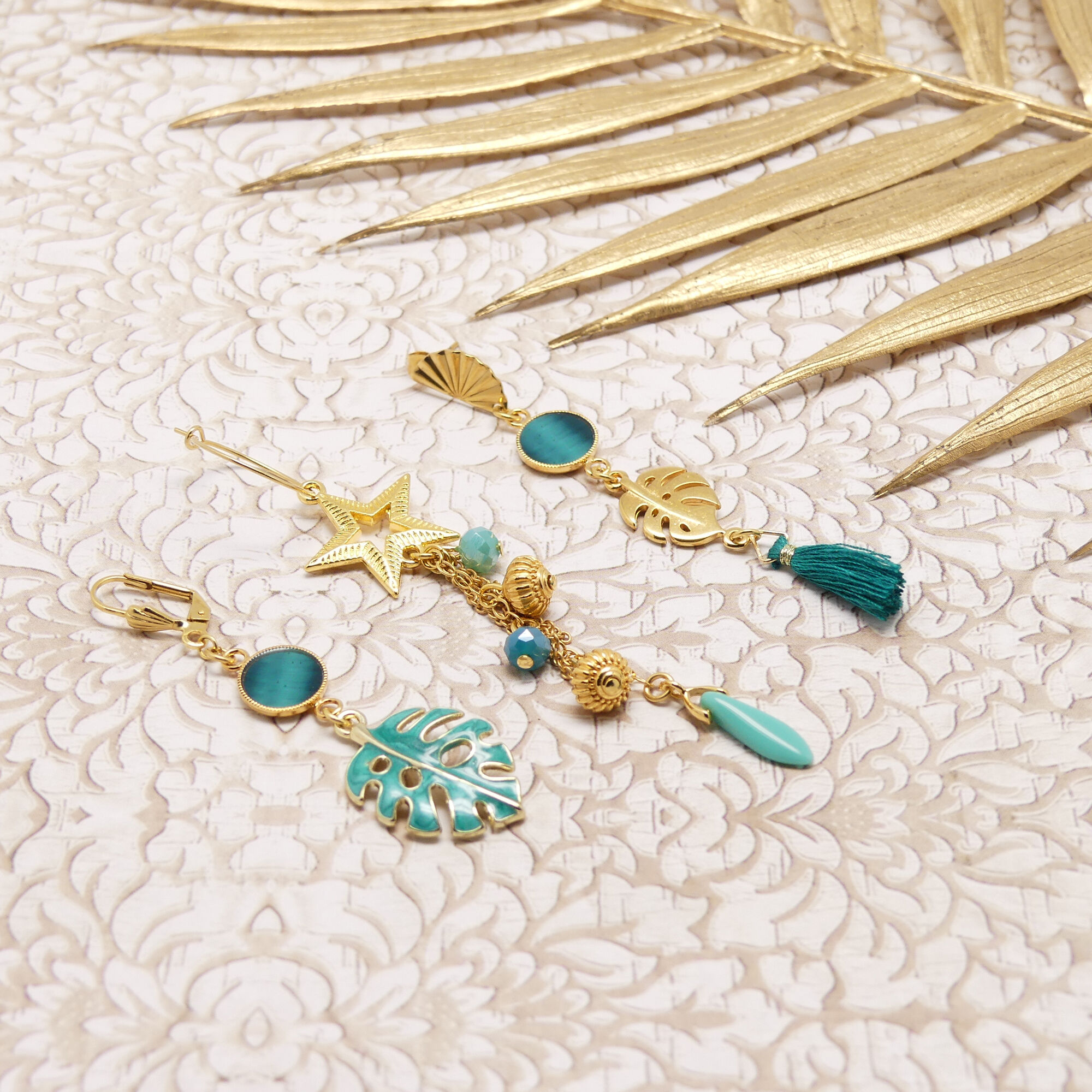 Trio earrings in turquoise and gold with star, pompom, and monstera leaf. 24k gold-plated brass jewelry. Mother's Day gift for mom, Christmas gift for teacher.