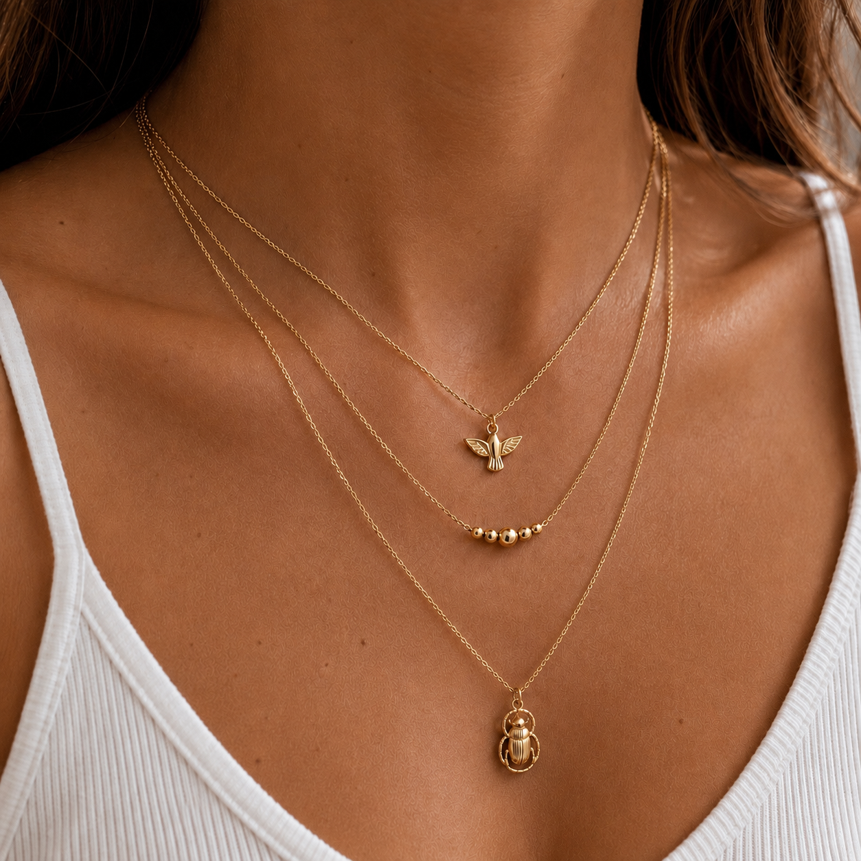 Gold triple strand necklace Dove & Scarab