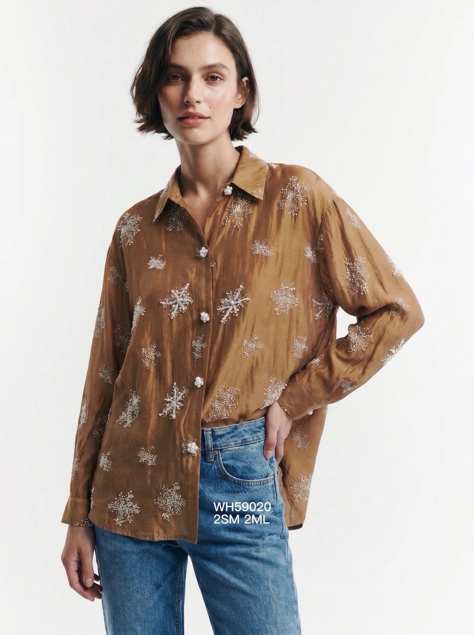 Long, flowing shirt with delicate embroidery