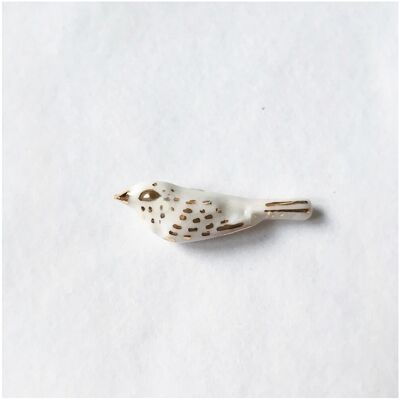 Broche oiseau -blanc