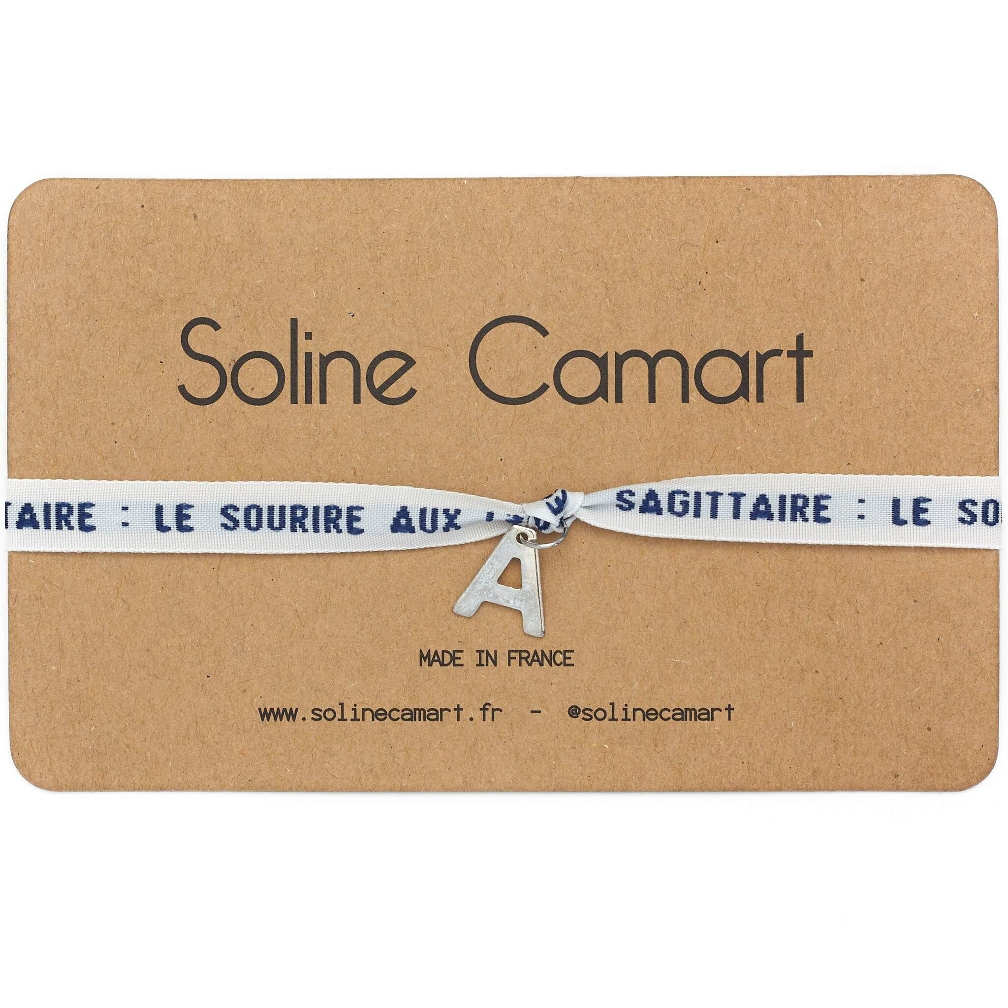 SAGITARIO: SONRISA EN LOS LABIOS - Azul - Letra