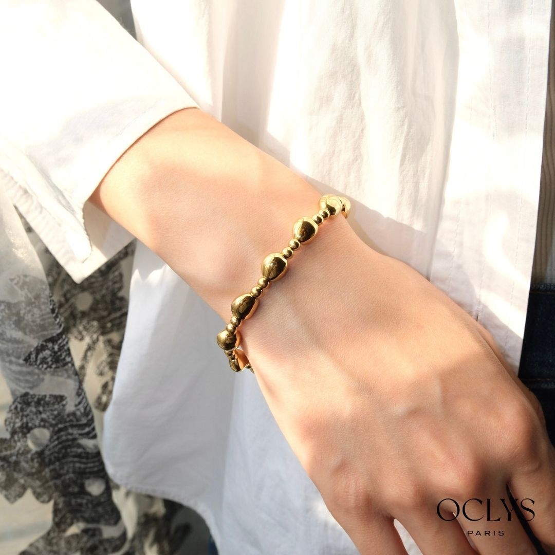 elastic bracelet with asymmetrical stainless steel balls