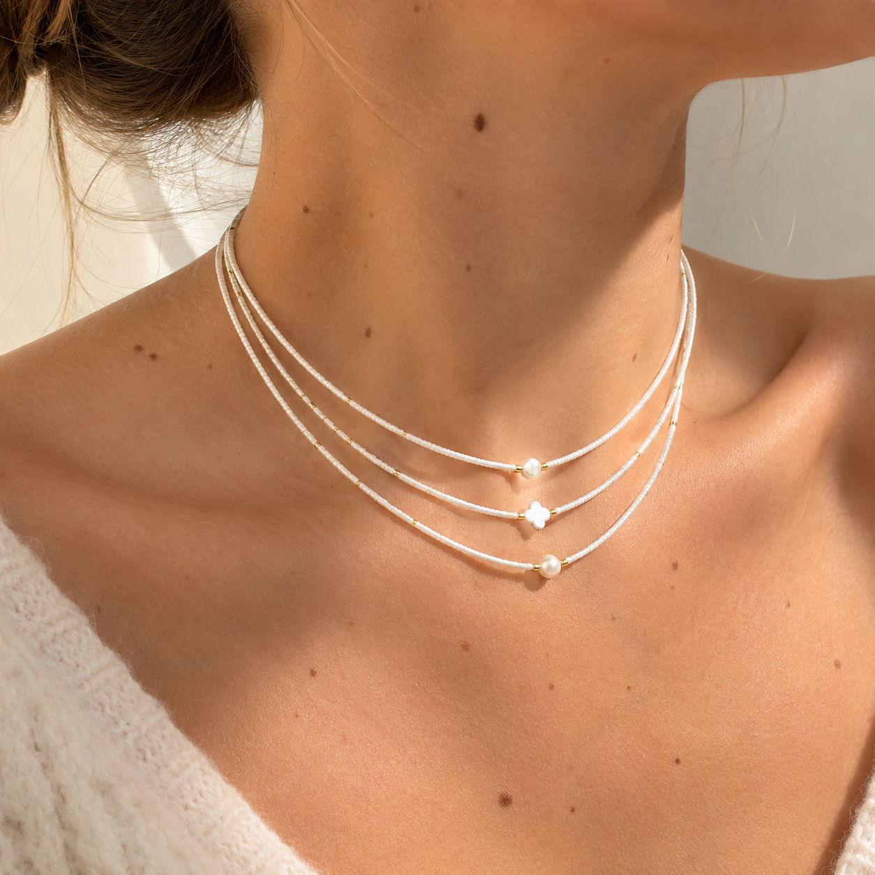 Triple-strand Miyuki necklace with mother-of-pearl and cultured pearl