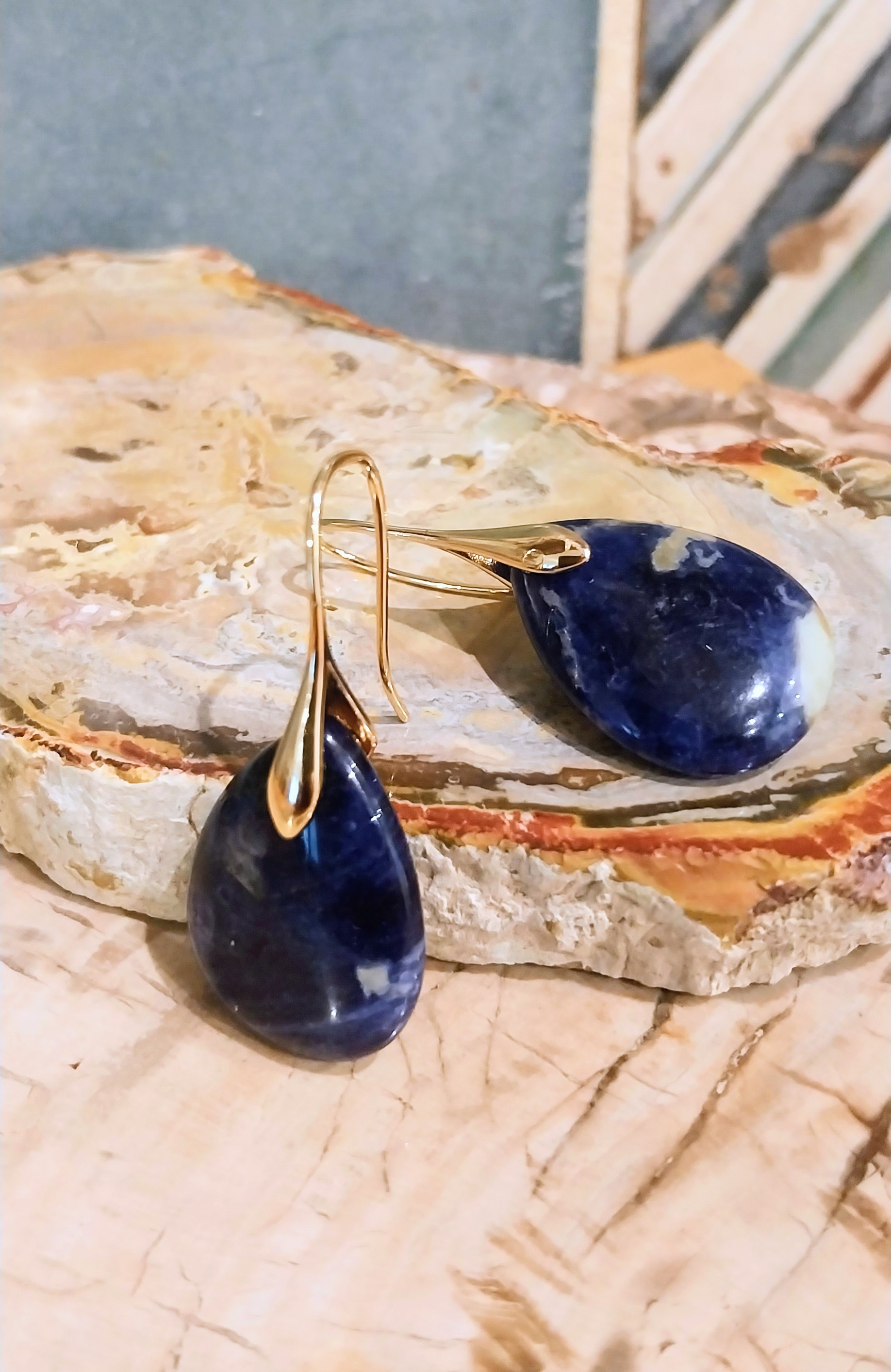 Earrings on a broken piece.Natural Lapis Lazuli