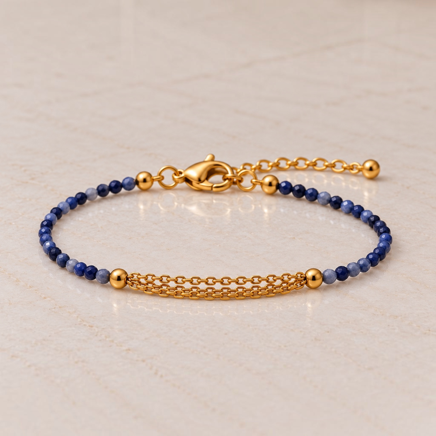 Bracelet with faceted natural stones and three chains – Gold-plated stainless steel