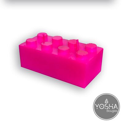 Neon pink brick candle