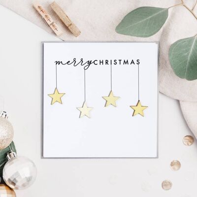 Frohe Weihnachten Karte mit hängenden Sternen aus Holz