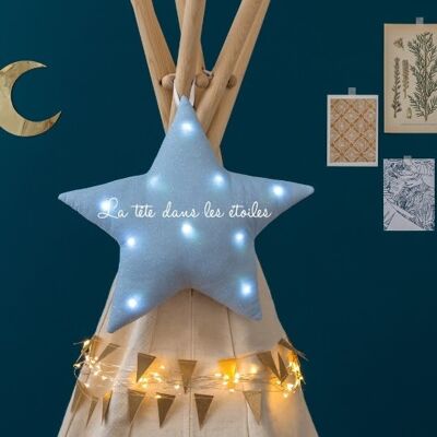 Luce notturna musicale stella blu glitterata "testa tra le stelle"