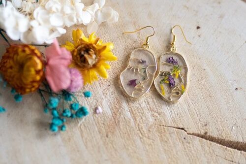 Floral face gold earrings
