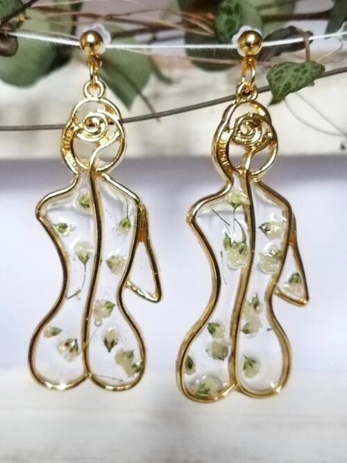 Female figure gold earrings