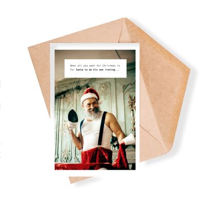 Cartolina d'auguri di Natale con foto di stiratura di Babbo Natale birichino
