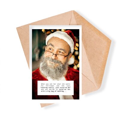 Biglietto di auguri di Natale con foto di Babbo Natale birichino