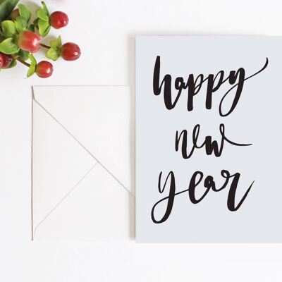 Tarjeta gris claro de feliz año nuevo