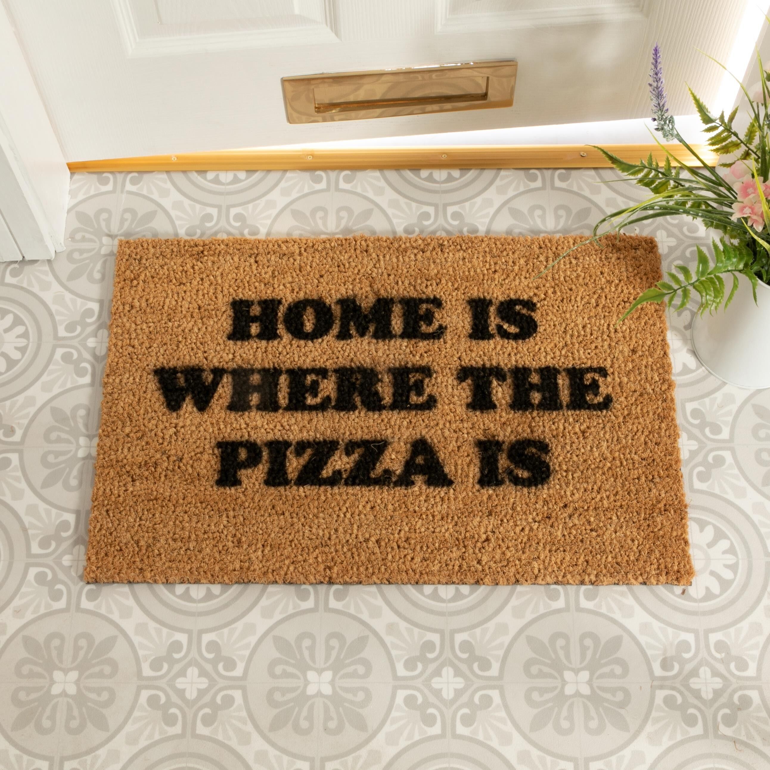 El hogar es donde está la pizza Felpudo