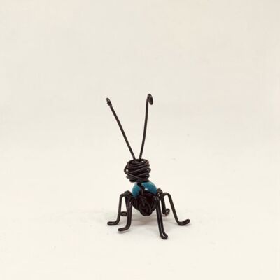 Ant with turquoise wood ball