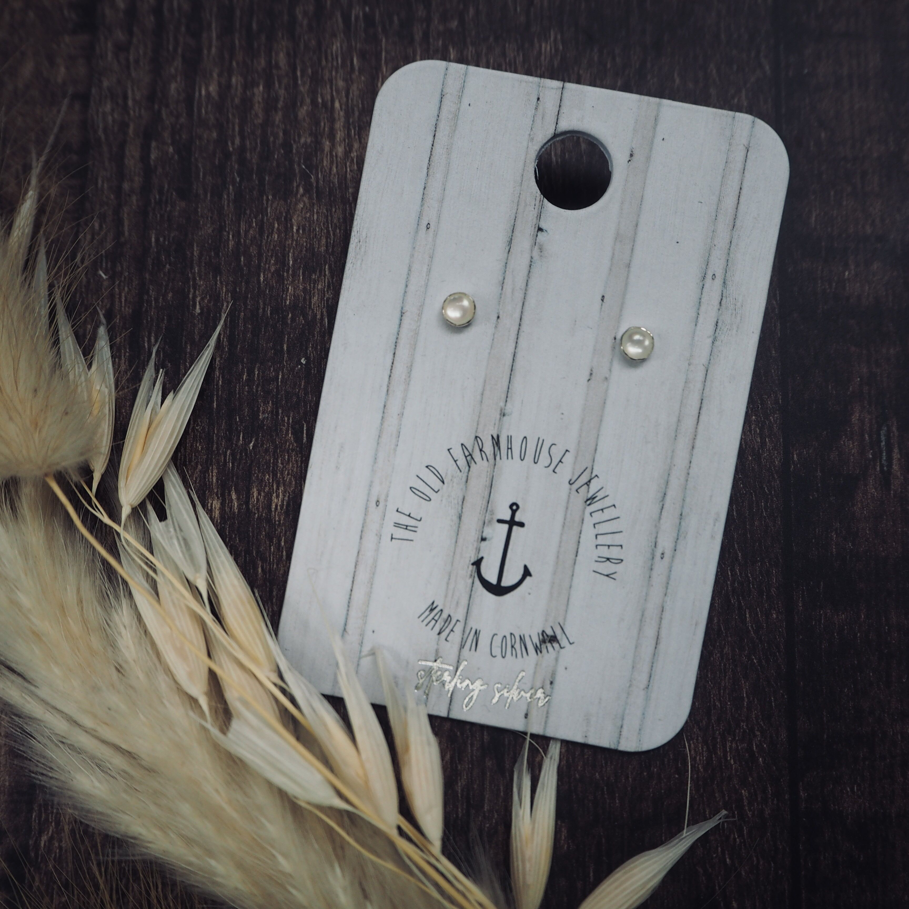 Borchie con incastonatura di pietre - Madreperla