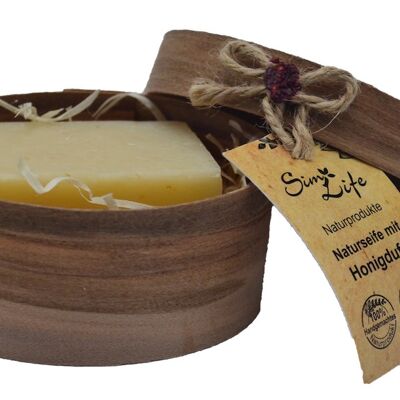 Natural soap with honey in wooden packaging