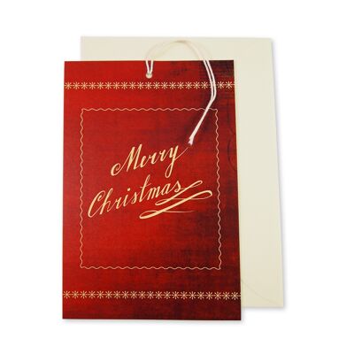 Cartolina di Natale / tag "Merry Christmas" - su uno sfondo rosso vellutato